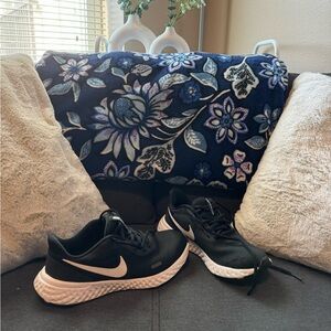 Comfortable Nike Revolution tennis shoes. Size 7.5 but fits 7.